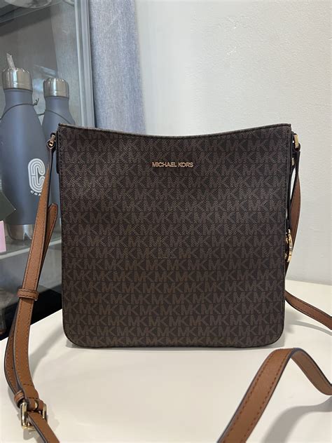 michael kors handbag jet set travel large messenger bag brown|Michael Kors woven crossbody bag.